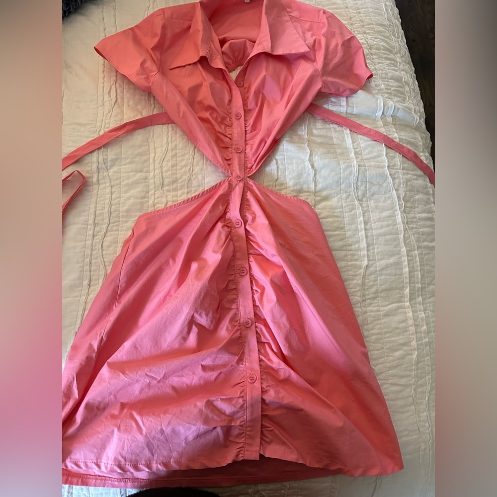 Pink dress from the boutique Voda size medium but could also fit a small